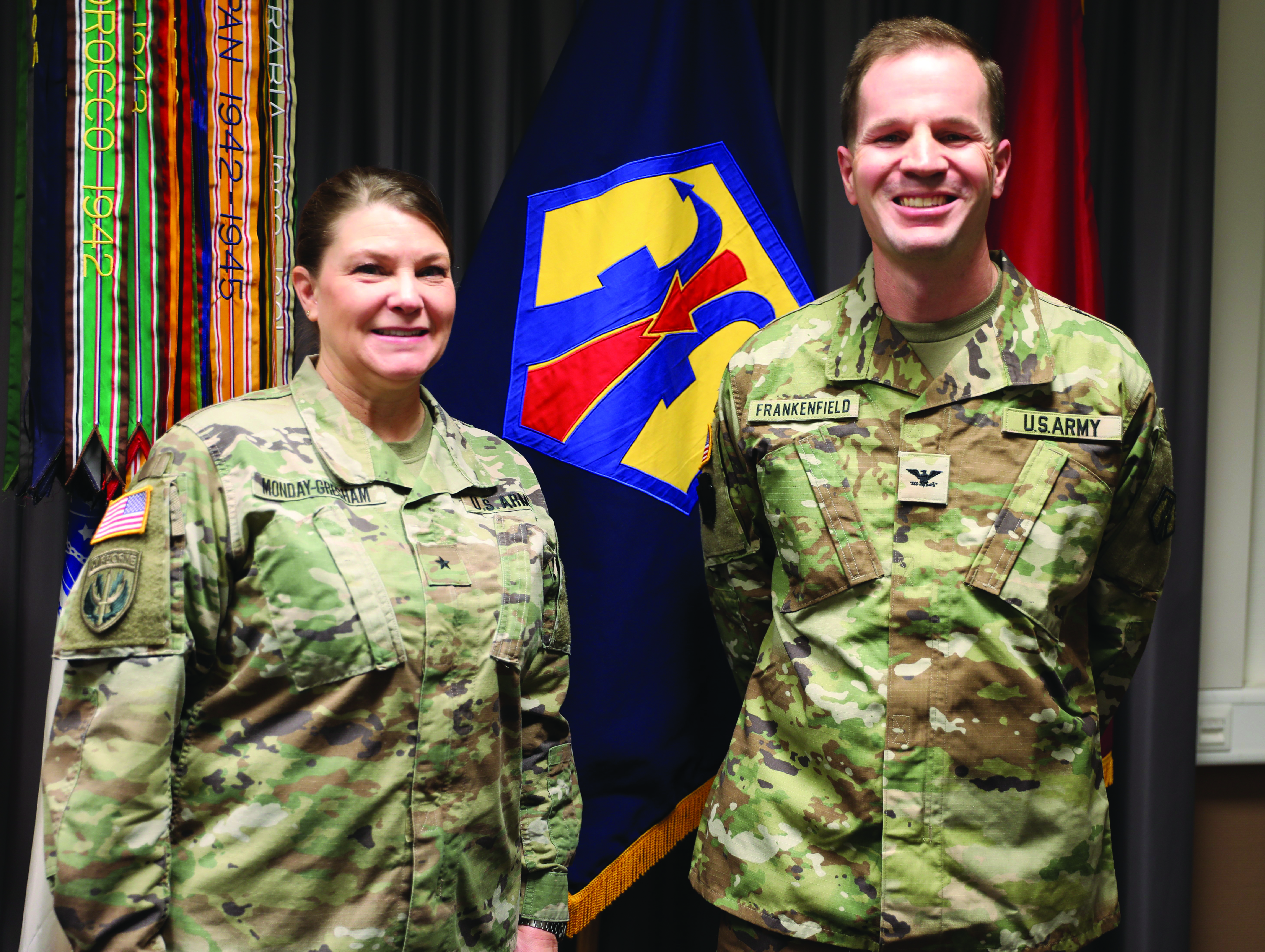 BG Karen Monday-Gresham, Commanding General of the 7th Mission Support Command, poses with newly promoted COL Jason Frankenfield, her staff judge advocate, following his promotion ceremony at the command headquarters in Kaiserslautern, Germany. (Credit: SSG Jessica Forester)